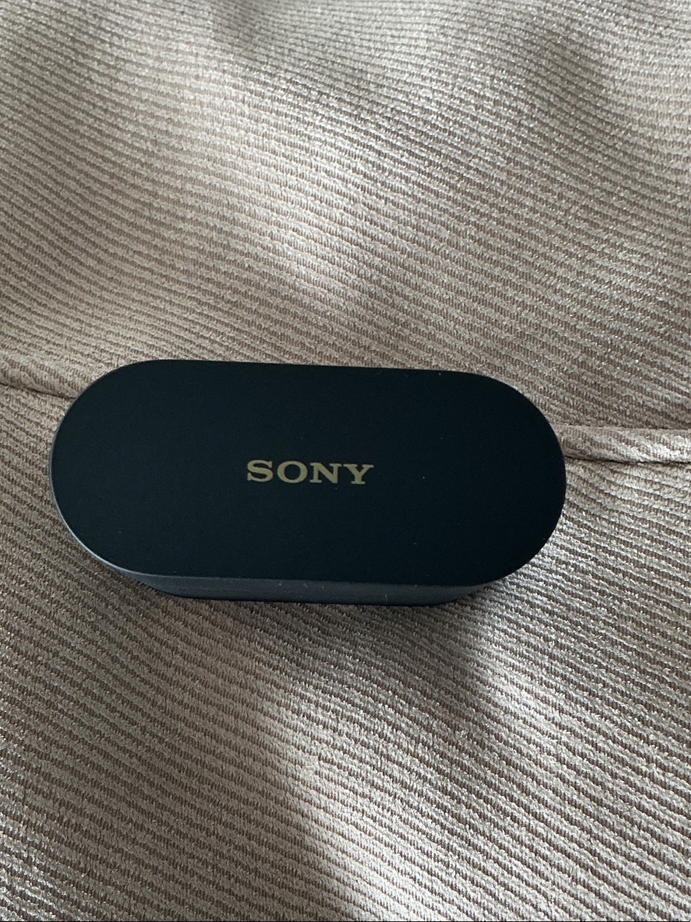 Sony Black Charging Case with Gold Logo